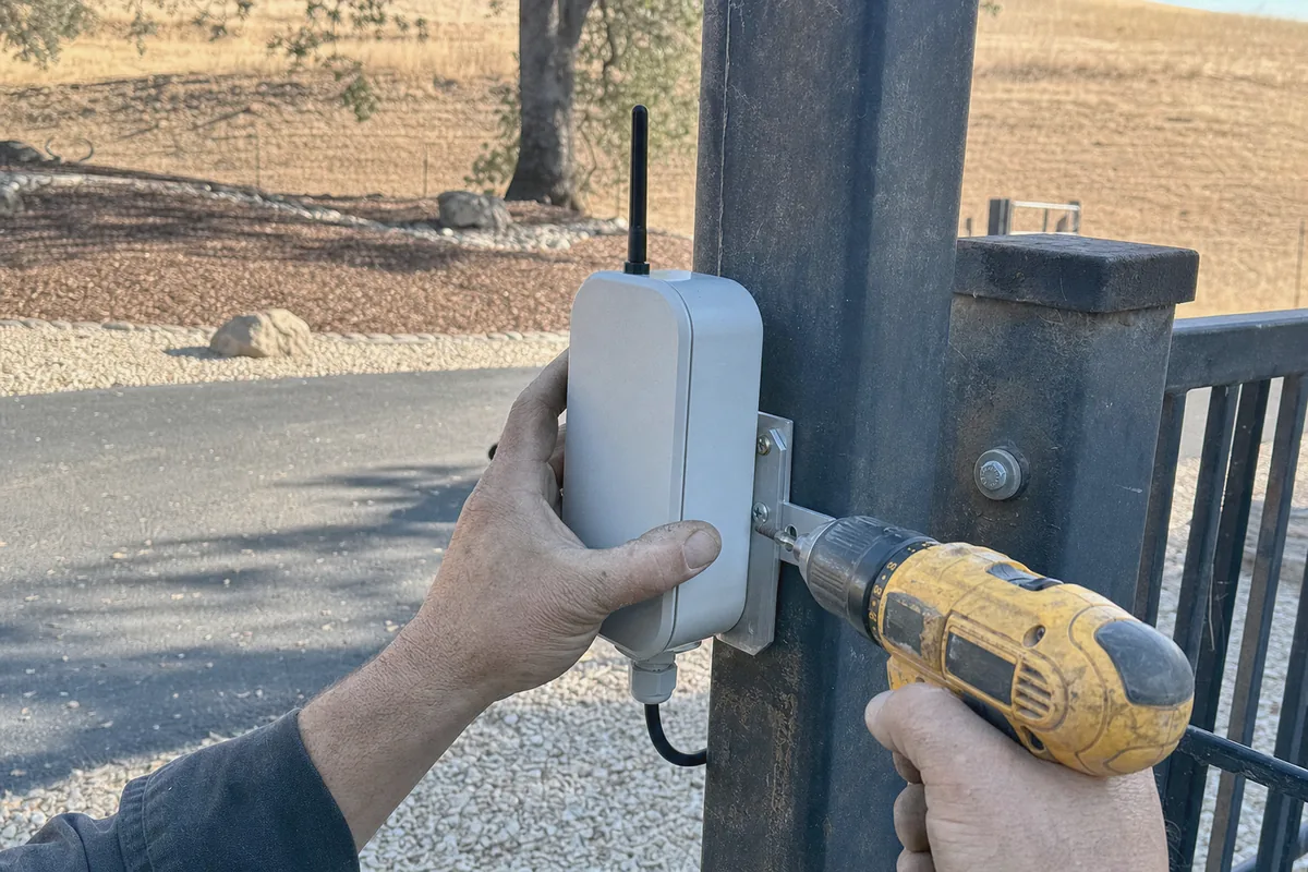 Close-up of smart metal gate installation work in progress